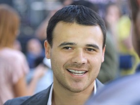 In this photo taken June 2, 2011, Emin Agalarov, son of Araz Agalarov, an ethnic Azerbaijani business leader living in Moscow, seen during a party in Moscow, Russia. They may have been the hidden link between Donald Trump's campaign and Russia's government: A Moscow-based billionaire and his pop star son, who like Trump bridged the diverse worlds of real estate, the entertainment industry and the highest level of politics. (AP Photo/Mikhail Metzel)