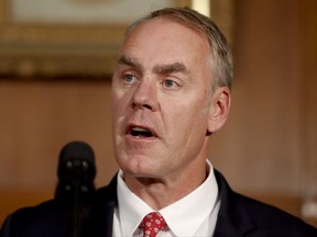 FILE - In this April 26, 2017, file photo, Interior Secretary Ryan Zinke speaks at the Interior Department in Washington, before President Donald Trump signed an Antiquities Executive Order. Zinke says he is removing Colorado's Canyons of the Ancients from a list of national monuments being reviewed nationwide. Zinke said July 21 that when he and President Donald Trump launched the review of 27 national monuments designated by previous administrations, "we absolutely realized that not all monuments are the same and that not all monuments would require modifications." (AP Photo/Carolyn Kaster, file)