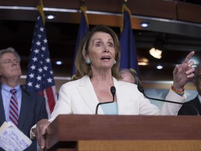 In this July 20, 2017 photo, House Minority Leader Nancy Pelosi, D-Calif., flanked by, Rep. Frank Pallone, D-N.J., the ranking member of the House Energy and Commerce Committee, left, and Rep. Bobby Scott, D-Va., the ranking member on the House Committee on Education and the Workforce, discusses the Republican efforts to replace "Obamacare," during a news conference on Capitol Hill in Washington.  Democrats are trying to bounce back from their November election losses and rebrand themselves, rolling out a populist new agenda under the slogan "A Better Deal."   (AP Photo/J. Scott Applewhite)