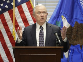 FILE - In this July 12, 2017, file photo, Attorney General Jeff Sessions speaks to federal, state and local law enforcement officials about sanctuary cities and efforts to combat violent crime, in Las Vegas. The Justice Department escalated its promised crackdown on so-called sanctuary cities on July 25, saying it will no longer give cities coveted grant money unless they give federal immigration authorities access to jails and provide advance notice when someone in the country illegally is about to be released. (AP Photo/John Locher, File)