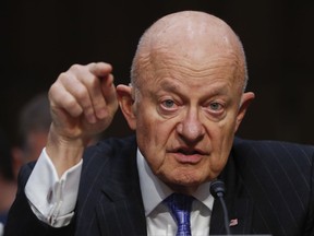 FILE - In this Monday, May 8, 2017, file photo, former National Intelligence Director James Clapper testifies on Capitol Hill in Washington. Two former top intelligence officials are harshly criticizing President Donald Trump for not standing up to Russia for meddling in the presidential election. Clapper wonders aloud whether the president's real aim is to make "Russia Great Again." (AP Photo/Pablo Martinez Monsivais, File)