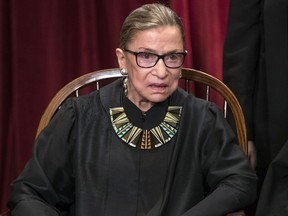 FILE - In this June 1, 2017, file photo, Associate Justice Ruth Bader Ginsburg joins other justices of the U.S. Supreme Court for an official group portrait at the Supreme Court Building in Washington. Ginsburg says the Trump administration was "too restrictive" in deciding what family relationships qualify as close enough to avoid the ban on travel from six mostly Muslim counties. Ginsburg said at a Duke Law School event in Washington that the court decided in an order this week that close relationships include grandparents and other relatives whom the administration initially left off its list of family members who would not be covered by President Donald Trump's 90-day travel ban. (AP Photo/J. Scott Applewhite, File)