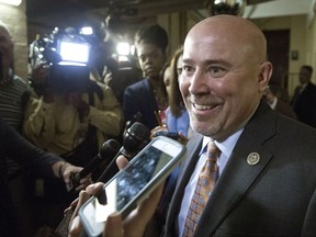 FILE- In this May 2, 2017 file photo, Rep. Tom MacArthur, R-N.J. speaks with reporters on Capitol Hill in Washington. Vulnerable House Republicans stood defiant about their support for an unpopular bill to repeal Obamacare as the effort languished in the Senate, leaving them to face angry voters with, perhaps, nothing to show for it. "I have no regrets. I am doing what I can as a member of Congress to solve problems. That's why I came here. I didn't come here to be potted plant," said MacArthur who played a key role in negotiating the House bill that narrowly passed in early May. (AP Photo/Cliff Owen, File)