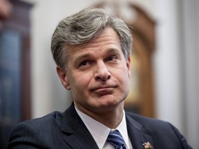 FILE - In this June 29, 2017 file photo, FBI Director nominee Christopher Wray meets with Sen. Charles Grassley, R-Iowa on Capitol Hill in Washington. Wray, nominated to replace James Comey as FBI director is described by those close to him as admirably low-key, yet he'd be taking over the law enforcement agency at a moment when its under an intense spotlight. (AP Photo/Andrew Harnik, File)