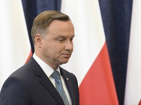 Polish President Andrzej Duda makes a statement in Warsaw, Poland, Monday, July 24, 2017. Duda announced that he will veto two contentious bills widely seen as assaults on the independence of the judicial system. (AP Photo/Alik Keplicz)