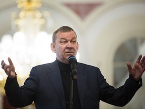 Director of the Bolshoi Theater Vladimir Urin gestures while speaking to the media at the Bolshoi Theater in Moscow, Russia, Monday, July 10, 2017. Russia's legendary Bolshoi Theater has cancelled a much anticipated ballet about the dancer Rudolf Nureyev just three days before the opening night. (AP Photo/Alexander Zemlianichenko)