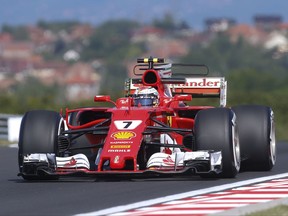 Ferrari driver Kimi Raikkonen of Finland steers his car during the first free practice session at the Hungaroring racetrack in Mogyorod, northeast of Budapest, Hungary, Friday July 28, 2017. The Hungarian Formula One Grand Prix will be held on Sunday July, 30. (AP Photo/Darko Bandic)