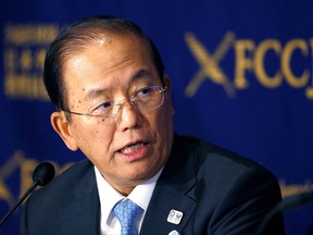 Tokyo Organizing Committee of Tokyo 2020 Olympics CEO Toshiro Muto speaks during a press conference at the Foreign Correspondents' Club of Japan in Tokyo, Tuesday, July 18, 2017. Muto said that uncertainty over the final budget will continue until 2019, the year before the Summer Games. "We will continue to explore more cost efficiencies," Muto told the foreign media amid concerns regarding the higher-than-projected costs. (AP Photo/Shizuo Kambayashi)