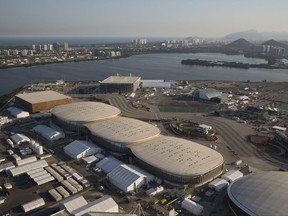 File - In this July 4, 2016 file photo, the Olympic Park of the 2016 Olympics is seen from the air, in Rio de Janeiro, Brazil. The International Olympic Committee said on Sunday, July 9 2017, that it has declined to step in and help Rio Olympic organizers with a debt estimated at between $35-40 million.(AP Photo/Felipe Dana, File)
