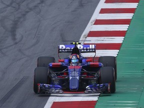 Toro Rosso driver Carlos Sainz of Spain steers his car during the second free practice session, at the Red Bull Ring in racetrack, in Spielberg, Austria, Friday, July 7, 2017. The Formula One Grand Prix will be held on Sunday. (AP Photo/Darko Bandic)