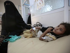 A girl is treated for suspected cholera infection at a hospital in Sanaa, Yemen, Saturday, Jul. 1, 2017. The World Health Organization says a rapidly spreading cholera outbreak in Yemen has claimed 1500 lives since April and is suspected of affecting 246,000 people. (AP Photo/Hani Mohammed)