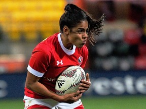 Canada's Magali Harvey, seen in an International Women's Rugby Series match against the New Zealand in June, was the player of the match in the World Cup opener on Wednesday, Aug. 9.
