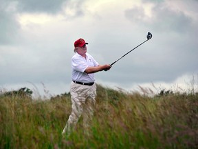 This file photo taken on July 10, 2012 shows Donald Trump playing golf in Aberdeenshire, Scotland