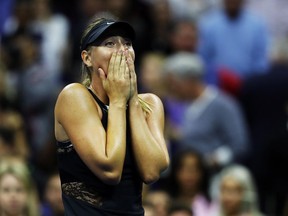 Maria Sharapova celebrates her win over Simona Halep at the U.S. Open on Aug. 28.