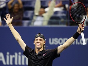 Denis Shapovalov celebrates his win over Jo-Wilfried Tsonga at the U.S. Open on Aug. 30.