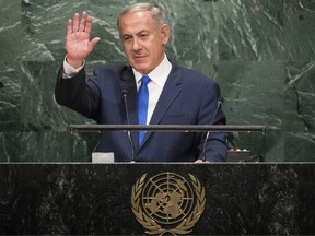 Prime Minister of Israel Benjamin Netanyahu waves to the audience after addressing the United Nations General Assembly at UN headquarters, September 22, 2016 in New York City.