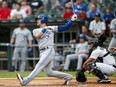 Josh Donaldson of the Toronto Blue Jays hits a home run during the first inning against the White Sox at Guaranteed Rate Field in Chicago on Tuesday night.