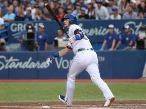 Josh Donaldson of the Blue Jays watches his two-run homer in the third inning against the New York Yankees at Rogers Centre in Toronto on Tuesday night.
