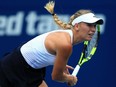 Caroline Wozniacki of Denmark serves against Karolina Pliskova of Czech Republic during their quarter-final match at the Rogers Cup at Aviva Centre in Toronto on Friday.