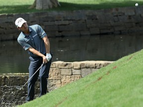 Kevin Kisner plays his shot on the seventh hole during the third round of the PGA Championship on Saturday at Quail Hollow Club in Charlotte, N.C.