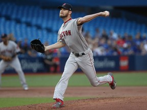 Chris Sale of the Boston Red Sox delivers a pitch in the first inning against the Blue Jays at Rogers Centre in Toronto on Tuesday night.