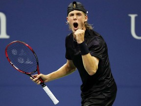 Denis Shapovalov of Canada celebrates after beating Jo-Wilfried Tsonga of France during their second round match at the U.S. Open in New York on Aug. 30.