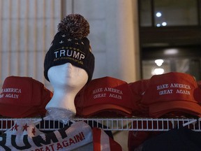 This file photo taken on January 20, 2017 shows hats displayed for sale on the morning of Donald Trump's inauguration as the 45th President of the United States in Washington, DC.