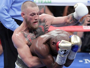 Conor McGregor sometimes found himself behind Floyd Mayweather Jr. trying to land punches.