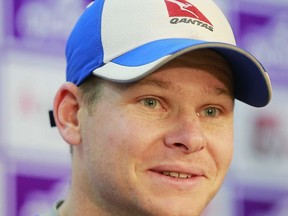 Australian cricket captain Steve Smith smiles as he speaks during a news conference in Dhaka, Bangladesh, Saturday, Aug. 19, 2017. Australia is scheduled to play two test matches against Bangladesh with the first test beginning Aug. 27 in Dhaka. (AP Photo/A.M. Ahad)