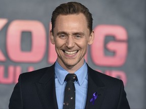 FILE - In this Wednesday, March 8, 2017 file photo, Tom Hiddleston arrives at the Los Angeles premiere of "Kong: Skull Island" at the Dolby Theatre. Thor" star Tom Hiddleston is to play Hamlet on the London stage _ but fans will need a bit of luck to get a ticket. Hiddleston is set to play the moody Danish prince for three-weeks in September at the Royal Academy of Dramatic Art's 180-seat theater, it was announced on Tuesday, Aug. 1, 2017. (Photo by Jordan Strauss/Invision/AP, File)
