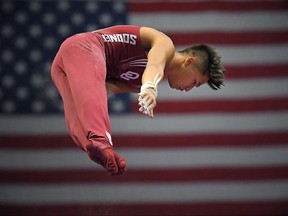 Yup Moldauer competes on the high bar during the final round of the men's U.S. gymnastics championships, Saturday, Aug. 19, 2017, in Anaheim, Calif. Moldauer won the overall title. (AP Photo/Mark J. Terrill)