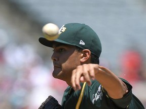 Oakland Athletics starting pitcher Sean Manaea throws to the plate during the first inning of a baseball game against the Los Angeles Angels, Sunday, Aug. 6, 2017, in Anaheim, Calif. (AP Photo/Mark J. Terrill)