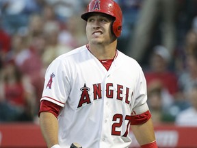 Los Angeles Angels' Mike Trout heads toward the dugout after striking out during the first inning of a baseball game against the Baltimore Orioles, Monday, Aug. 7, 2017, in Anaheim, Calif. (AP Photo/Jae C. Hong)