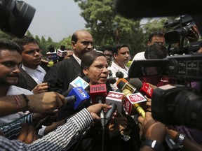 Farha Faiz, a Supreme Court lawyer, speaks to media after the apex court declared "Triple Talaq", a Muslim practice that allows men to instantly divorce their wives, unconstitutional in its verdict, in New Delhi, India, Tuesday, Aug. 22, 2017.