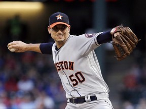 Houston Astros starting pitcher Charlie Morton throws to the Texas Rangers during the first inning of a baseball game, Friday, Aug. 11, 2017, in Arlington, Texas. (AP Photo/Tony Gutierrez)
