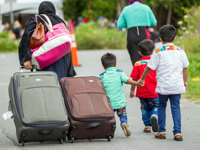 Asylum seekers near Champlain, New York, head toward the Canadian border earlier this month.