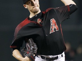 Arizona Diamondbacks' Patrick Corbin throws a pitch against the Chicago Cubs during the first inning of a baseball game, Saturday, Aug. 12, 2017, in Phoenix. (AP Photo/Ralph Freso)