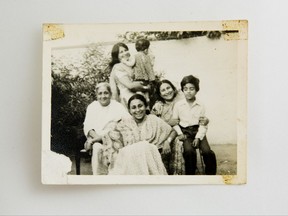 This late 1970's photo from the Naqvi & Zaidi family album shows Fahmida Hasan Zaidi, second right, with her mother Alamdari Begum, left, daughter Kahkashan Naqvi, front, younger sister Khurshid Zaidi, nephew Shiraz Zaidi, right, and young AP reporter Muneeza Naqvi in Lucknow, India. Zaidi lives in New Delhi while the rest of her seven siblings live in cities across Pakistan. For them, a generation raised on the idea that relationships could be nurtured for long periods on the simple sustenance of letters, physical distance has brought pain, but not an emotional distance. (AP Photo/Bernat Armangue)