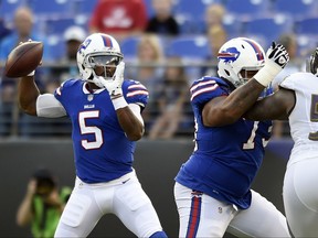 Buffalo Bills quarterback Tyrod Taylor (5) throws to a receiver in the first half of a preseason NFL football game against the Baltimore Ravens, Saturday, Aug. 26, 2017, in Baltimore. (AP Photo/Gail Burton)
