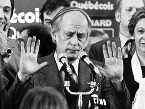 Former Quebec premier René Lévesque tries to hush supporters in Montreal, Nov.15, 1976, following his party’s victory in the provincial election. The PQ victory led to the Charter of the French Language, known as Bill 101.