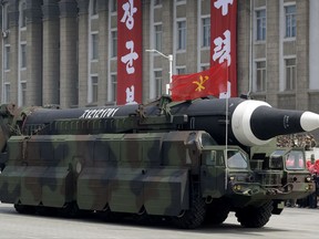 In this April 15, 2017, file photo, a missile that analysts believe could be the North Korean Hwasong-12 is paraded across Kim Il Sung Square in Pyongyang.
