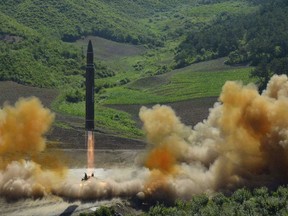 This July 4, 2017, file photo, distributed by the North Korean government shows what was said to be the launch of a Hwasong-14 intercontinental ballistic missile in North Korea.