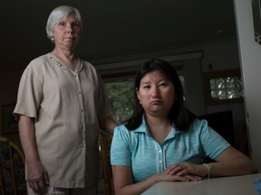 Yanhong Dewan, seated, and her mother, Yvonne Soulliere, have fought a five-year legal battle after Dewan was prevented from giving blood because of her intellectual disability.