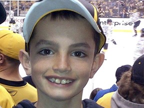 This undated file photo provided by Bill Richard shows his son, Martin Richard, in Boston. Martin was 8 years old when he was killed by the second of two bombs that exploded near the Boston Marathon finish line on April 15, 2013. An official groundbreaking for a park named in honor of the young bombing victim, will be held on Wednesday, Aug. 16, 2017, in Boston. (Bill Richard via AP, File)