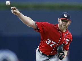 Washington Nationals starting pitcher Stephen Strasburg throws to a San Diego Padres batter during the first inning of a baseball game in San Diego, Saturday, Aug. 19, 2017. (AP Photo/Alex Gallardo)