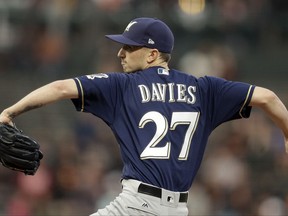 Milwaukee Brewers pitcher Zach Davies works against the San Francisco Giants in the first inning of a baseball game Monday, Aug. 21, 2017, in San Francisco. (AP Photo/Ben Margot)
