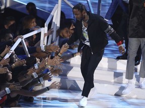 Kendrick Lamar accepts the award for video of the year for "HUMBLE." at the MTV Video Music Awards at The Forum on Sunday, Aug. 27, 2017, in Inglewood, Calif. (Photo by Matt Sayles/Invision/AP)