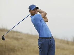 Golden State Warriors NBA basketball player Stephen Curry follows his drive from the 17th tee during the Web.com Tour's Ellie Mae Classic golf tournament Thursday, Aug. 3, 2017, in Hayward, Calif. (AP Photo/Eric Risberg)