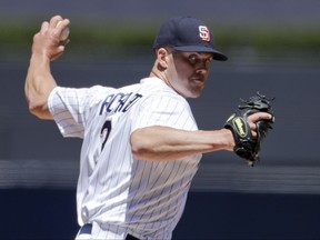 San Diego Padres starting pitcher Clayton Richard works against a Philadelphia Phillies batter during the first inning of a baseball game Wednesday, Aug. 16, 2017, in San Diego. (AP Photo/Gregory Bull)