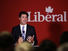 Prime Minister Justin Trudeau delivers remarks at the Laurier Club donor appreciation reception at the Delta Victoria Ocean Pointe in Victoria, B.C., on Friday, Aug 4, 2017. THE CANADIAN PRESS/Chad Hipolito